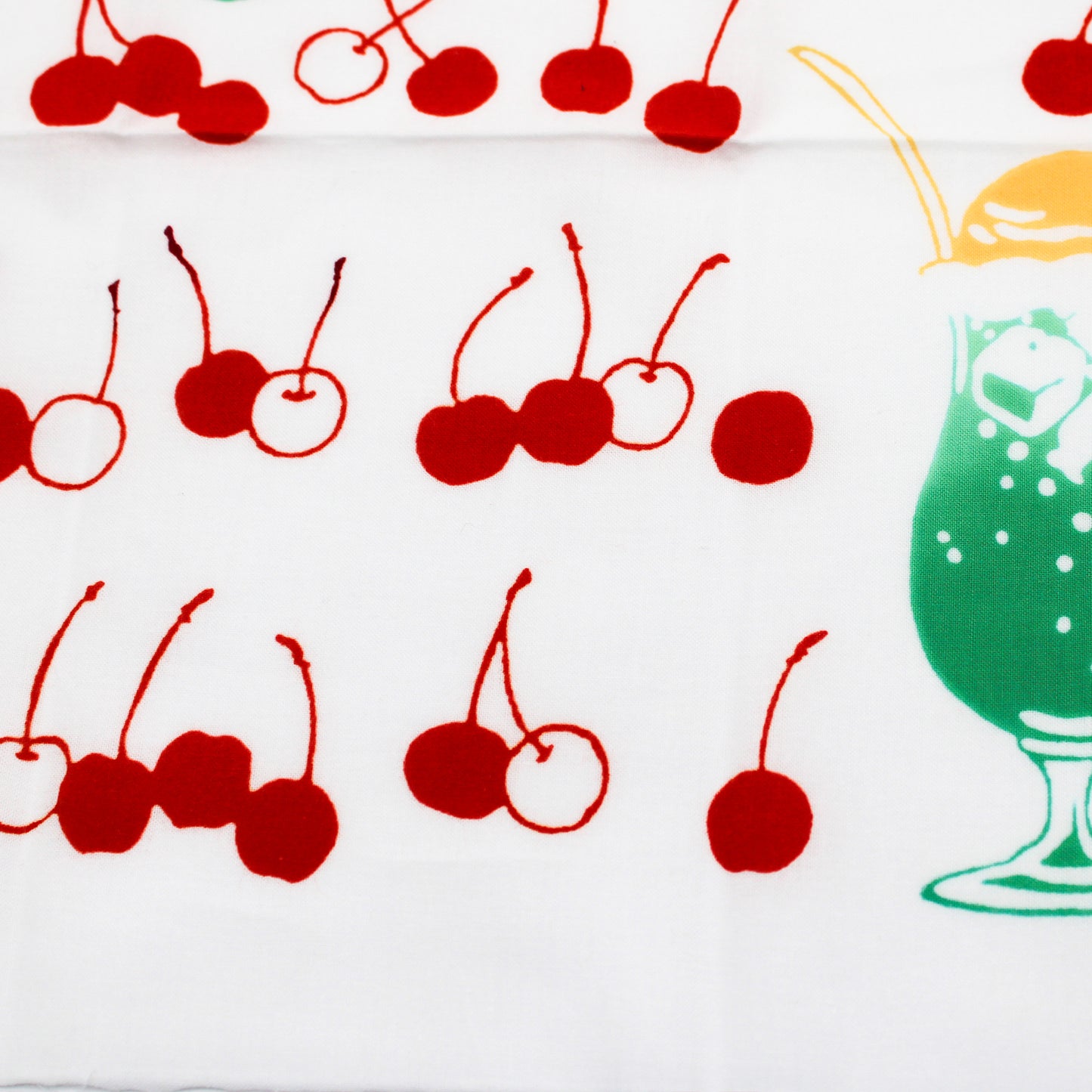 hand wiping (a towel) Creamsoda and Cherries