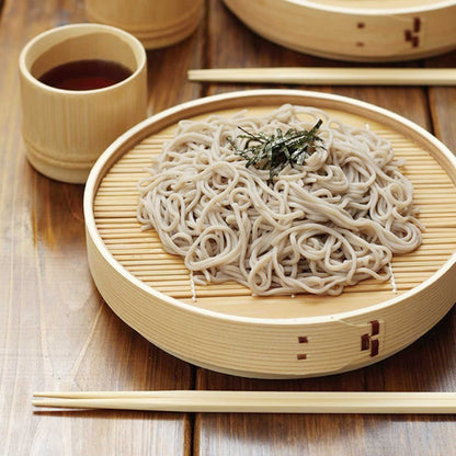 Authentic Japanese cold soba noodle presentation on Umezawa wooden magewappa plate