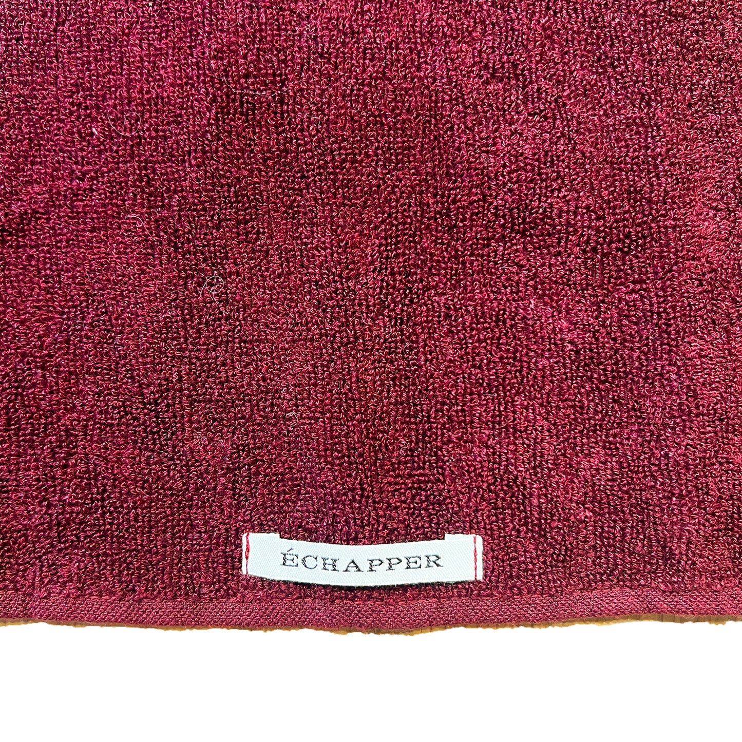 Botanicallitycoloured linen towel FACE Bordeaux