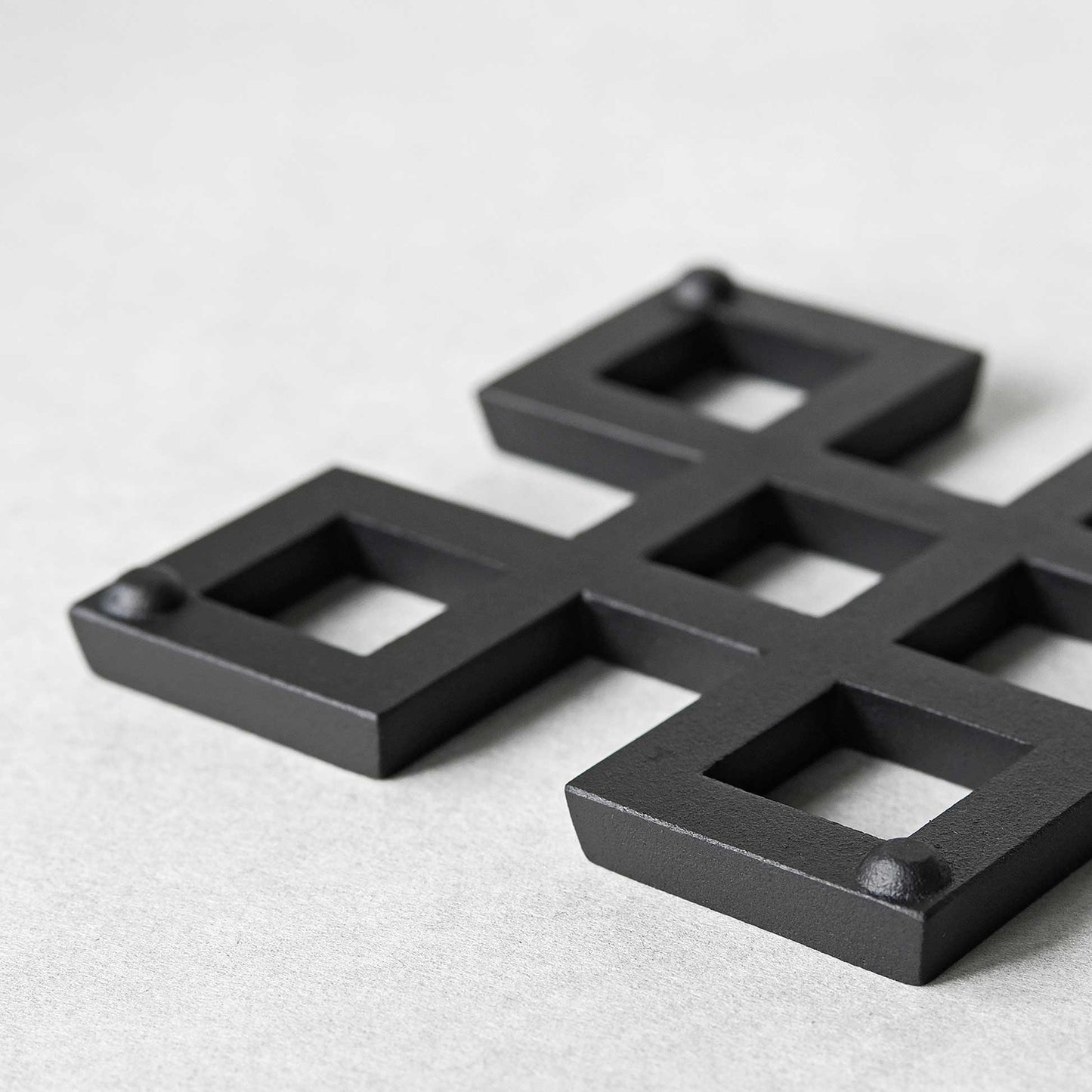 Iron Trivet "#" 5”